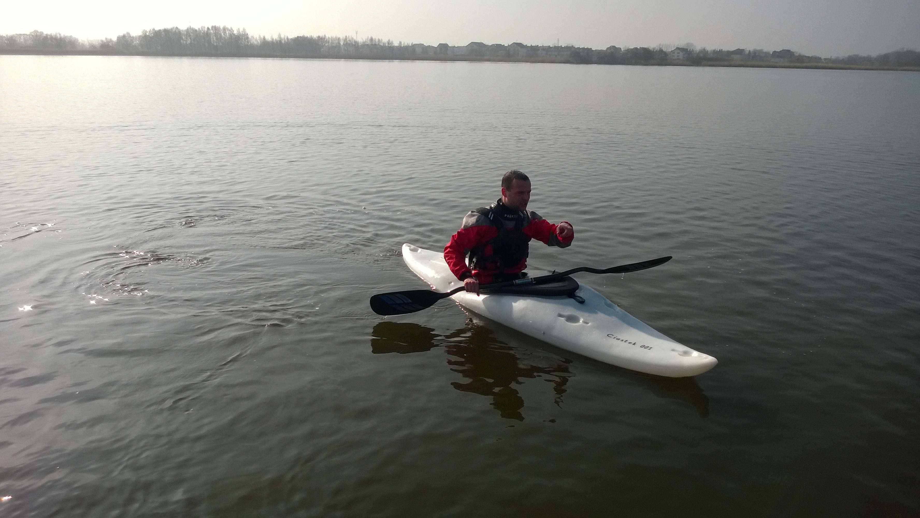 Author on the prototype on the water - first try :-) (white HDPE).